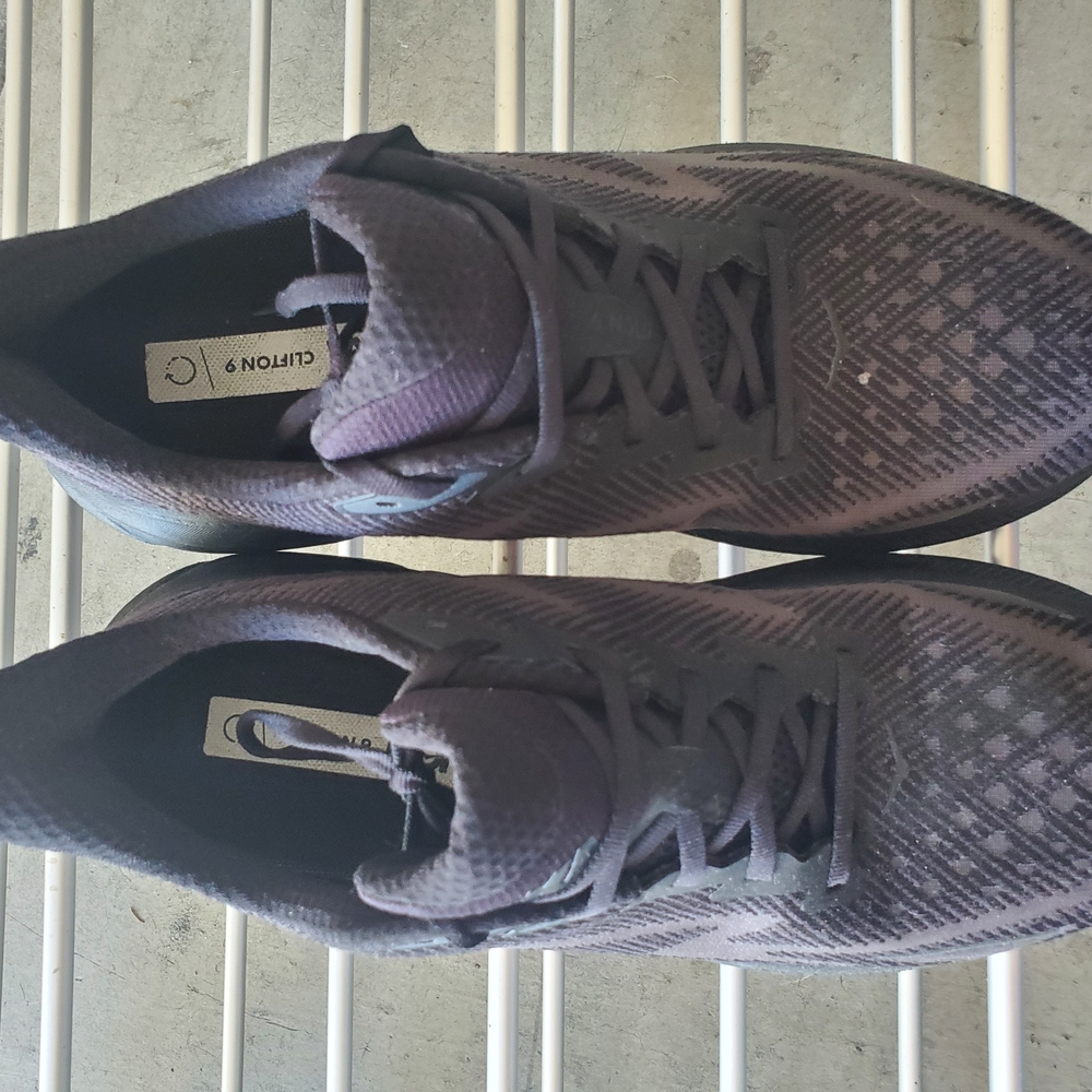 Hoka Black Athletic Shoes with Streamlined Design and Cushioned Support